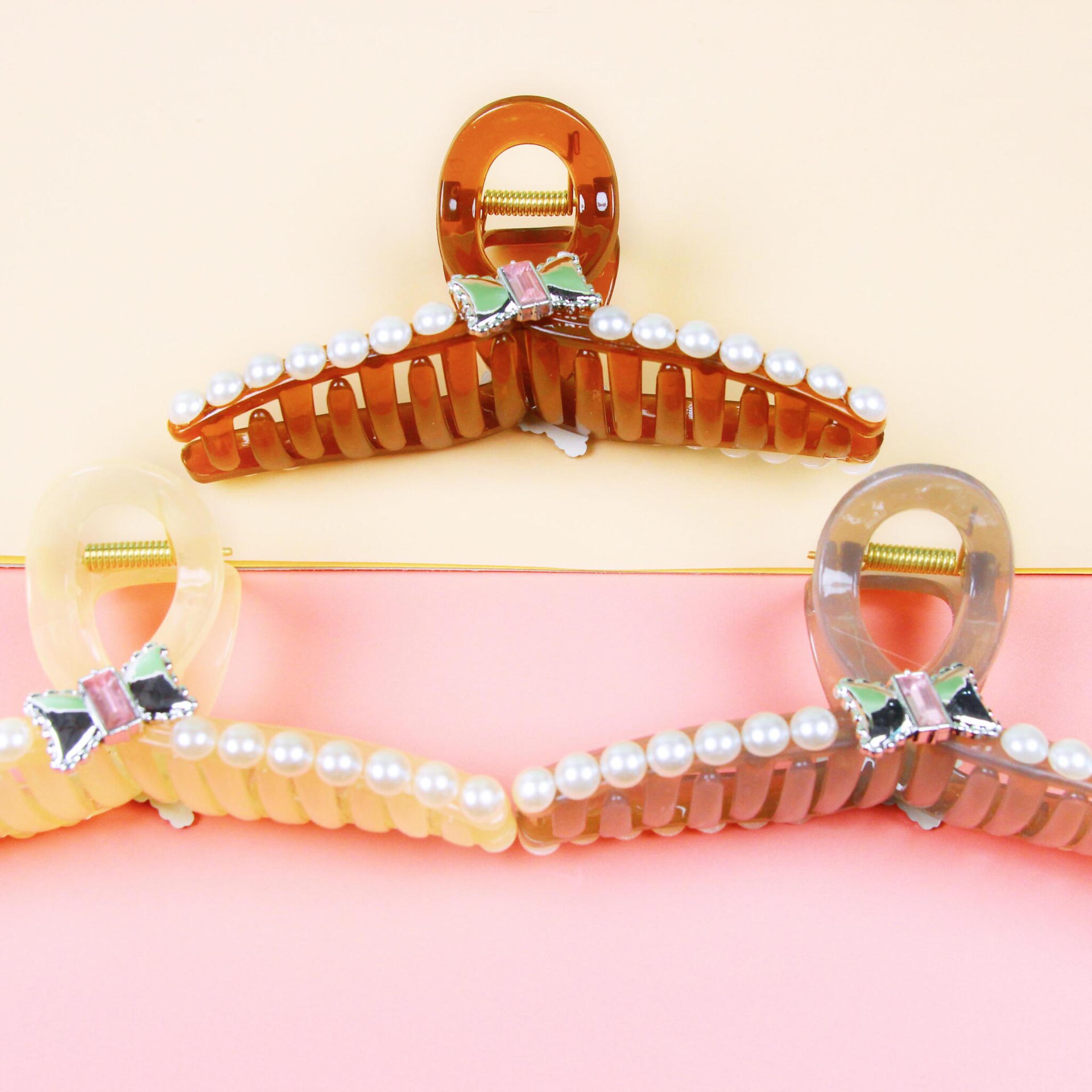 Kẹp tóc lớn ngọc trai nơ 11 Cm đóng hộp 2 Kẹp tóc lớn ngọc trai nơ 11 Cm đóng hộp